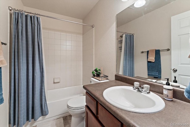 full bath with toilet, shower / tub combo, and vanity