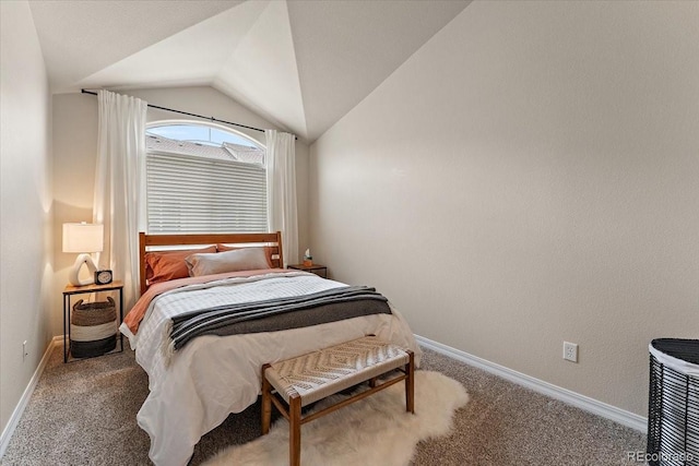 bedroom featuring carpet flooring, baseboards, and lofted ceiling