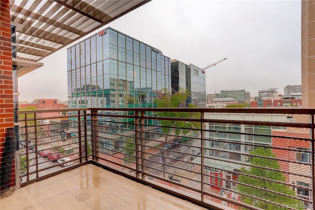 balcony featuring a city view