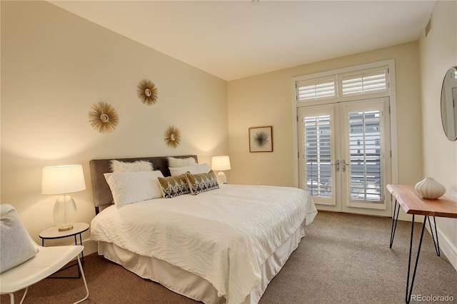 carpeted bedroom with access to outside, french doors, and baseboards