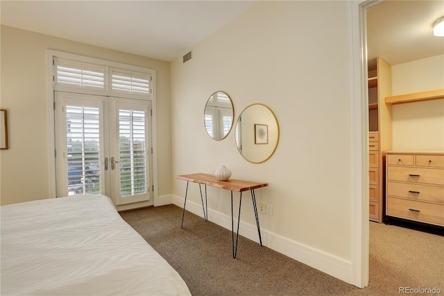 bedroom featuring carpet flooring, access to outside, and baseboards