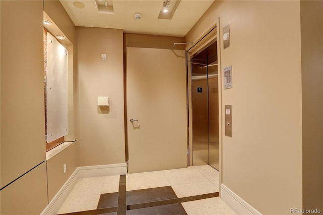 hallway with baseboards