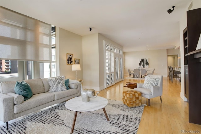 191 Clayton Ln Unit 402, Denver, CO 80206 - living area with light wood finished floors and baseboards