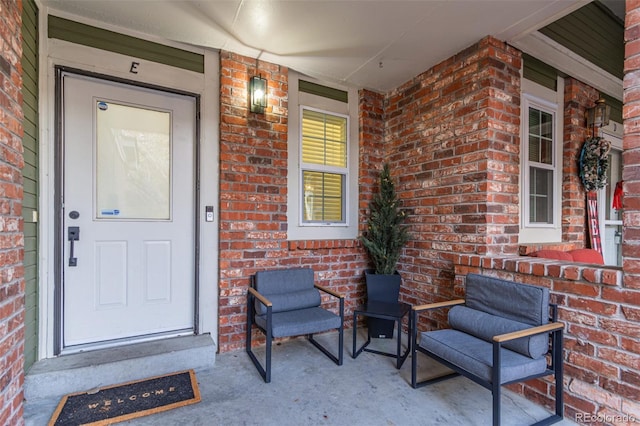 entrance to property featuring a porch