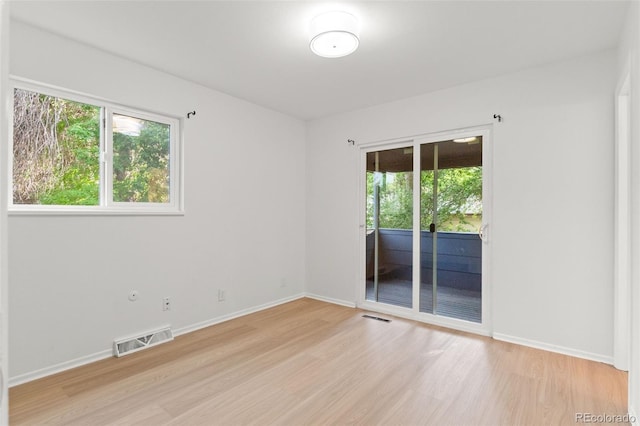1413 S Bryan Ave, Fort Collins, CO 80521 - spare room featuring light wood finished floors and baseboards