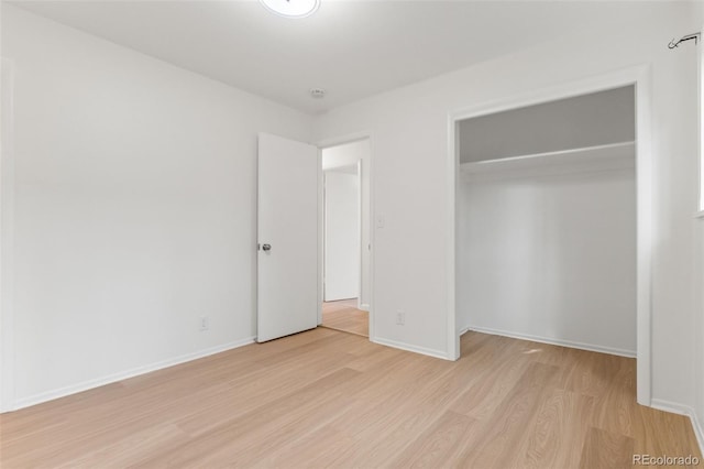 1413 S Bryan Ave, Fort Collins, CO 80521 - unfurnished bedroom featuring light wood finished floors and a closet
