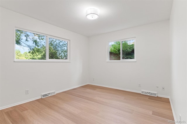 1413 S Bryan Ave, Fort Collins, CO 80521 - empty room featuring light wood-style flooring