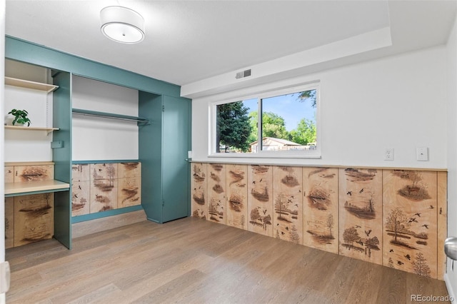 1413 S Bryan Ave, Fort Collins, CO 80521 - unfurnished bedroom with light wood-style flooring and a closet
