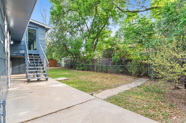 1413 S Bryan Ave, Fort Collins, CO 80521 - fenced backyard with a patio and stairway