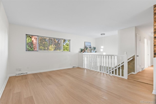 1413 S Bryan Ave, Fort Collins, CO 80521 - spare room with light wood-style flooring and baseboards