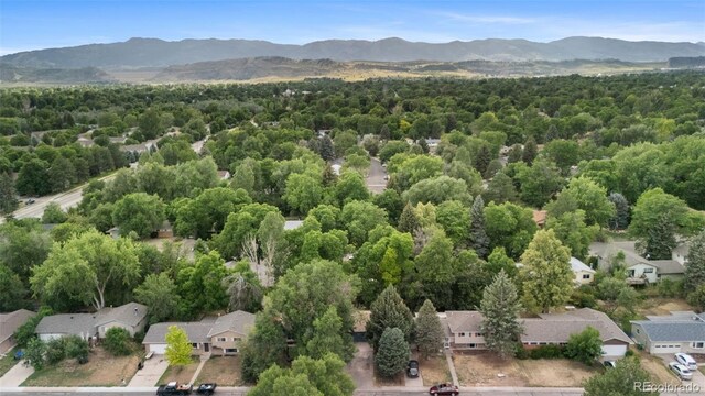 1413 S Bryan Ave, Fort Collins, CO 80521 - aerial perspective of suburban area with a mountain backdrop