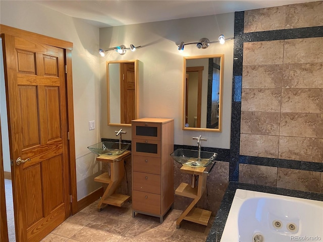 1123 S Quince Way, Denver, CO 80231 - bathroom with a jetted tub and tile walls