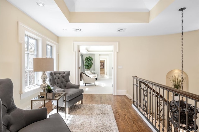 465 Monroe St, Denver, CO 80206 - sitting room with wood finished floors, baseboards, and recessed lighting