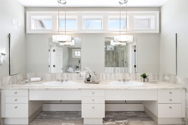 465 Monroe St, Denver, CO 80206 - full bathroom with a shower stall, double vanity, and plenty of natural light