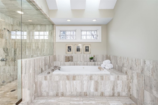 465 Monroe St, Denver, CO 80206 - bathroom featuring a garden tub, plenty of natural light, a shower stall, and marble finish flooring