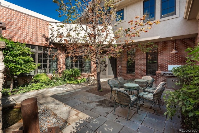 465 Monroe St, Denver, CO 80206 - view of patio / terrace featuring outdoor dining area