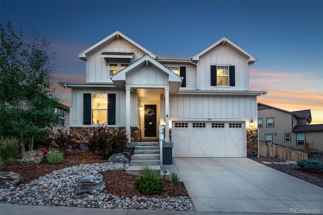 4082 Fortune Ln, Castle Rock, CO 80109 - craftsman-style home with an attached garage, stone siding, board and batten siding, and driveway