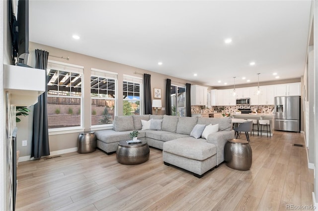4082 Fortune Ln, Castle Rock, CO 80109 - living room with light wood-style flooring and recessed lighting