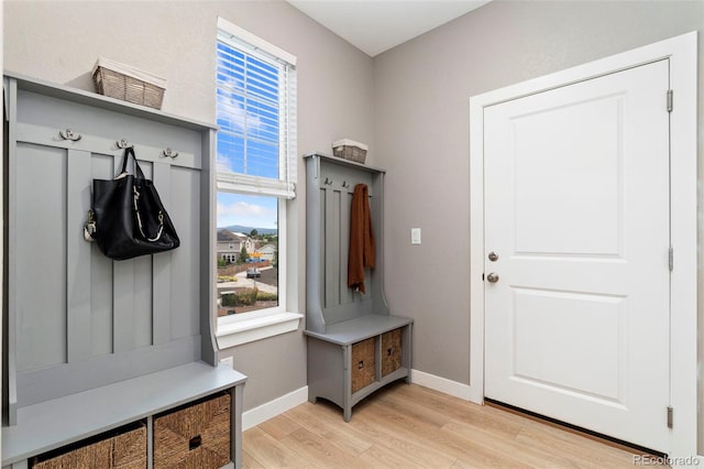 4082 Fortune Ln, Castle Rock, CO 80109 - mudroom featuring light wood-style floors and baseboards