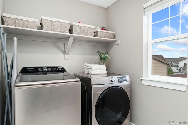 4082 Fortune Ln, Castle Rock, CO 80109 - laundry area with washing machine and clothes dryer
