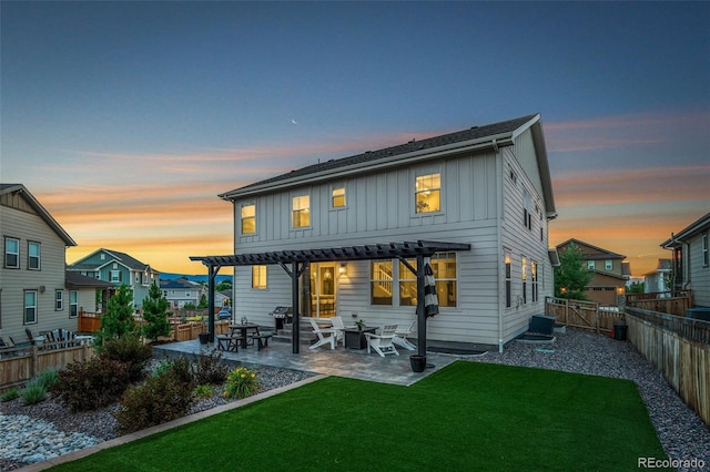 4082 Fortune Ln, Castle Rock, CO 80109 - rear view of property featuring a pergola, board and batten siding, a patio area, and a fenced backyard