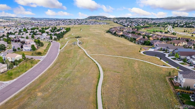 4082 Fortune Ln, Castle Rock, CO 80109 - aerial view of property and surrounding area with nearby suburban area and a mountainous background