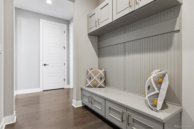 mudroom featuring recessed lighting, baseboards, and dark wood finished floors