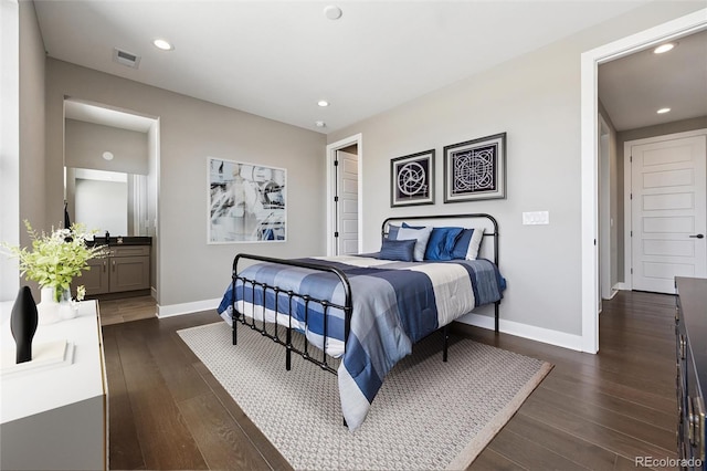 bedroom featuring recessed lighting, baseboards, visible vents, and dark wood-type flooring