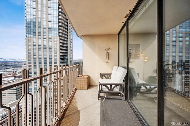 balcony featuring a city view