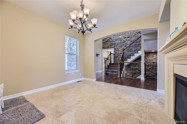 interior space featuring hardwood / wood-style flooring and a chandelier