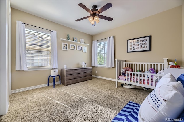 carpeted bedroom with ceiling fan