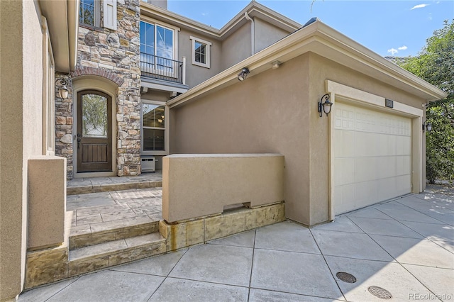 entrance to property with a garage