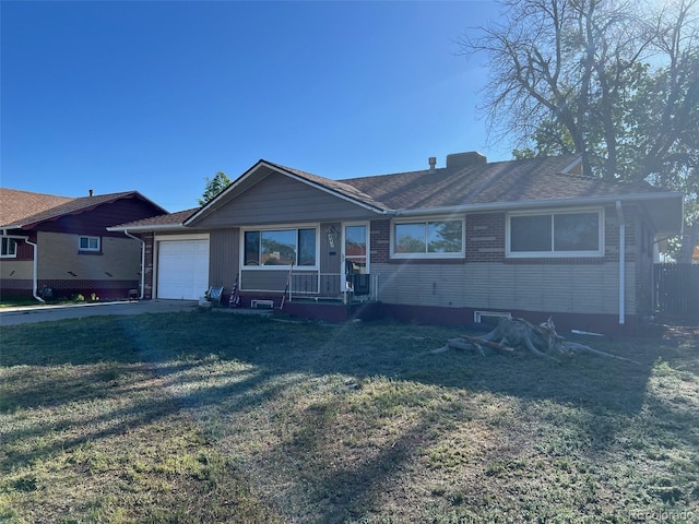 841 S 6th Ave, Brighton, CO 80601 - ranch-style house with a garage, a front yard, brick siding, and a chimney