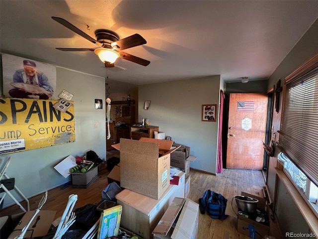 841 S 6th Ave, Brighton, CO 80601 - dining area featuring wood finished floors and a ceiling fan