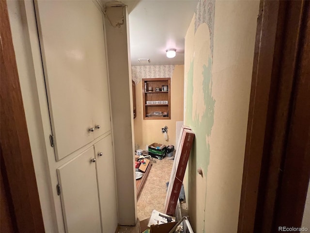 841 S 6th Ave, Brighton, CO 80601 - hallway with wallpapered walls