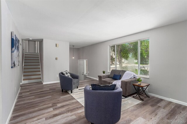 living room with hardwood / wood-style flooring