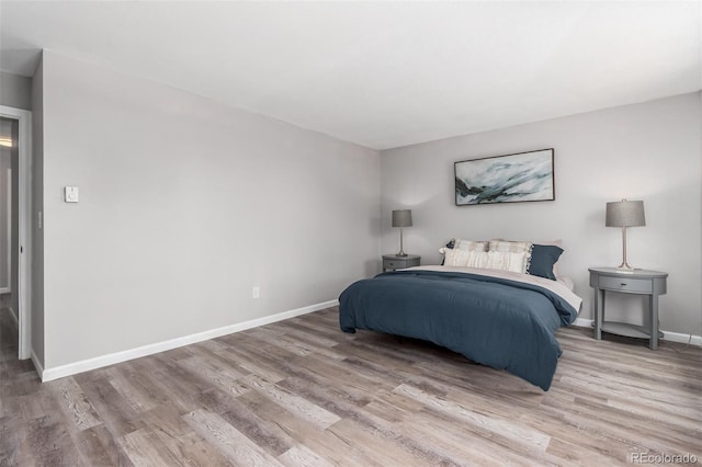 bedroom featuring wood-type flooring