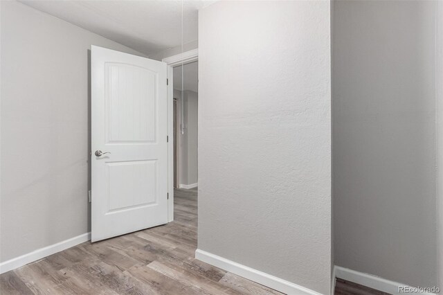 hallway featuring light hardwood / wood-style flooring