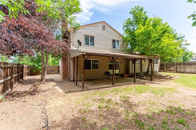 rear view of house with a patio area