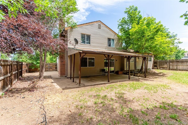 rear view of house with a patio area