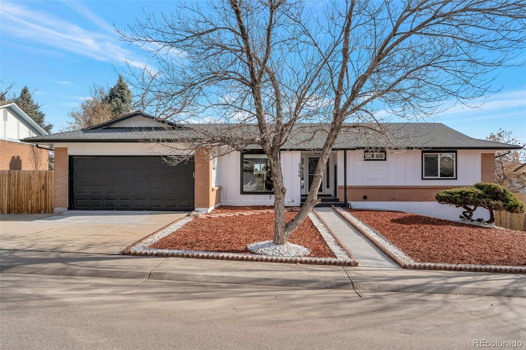 ranch-style home with a garage