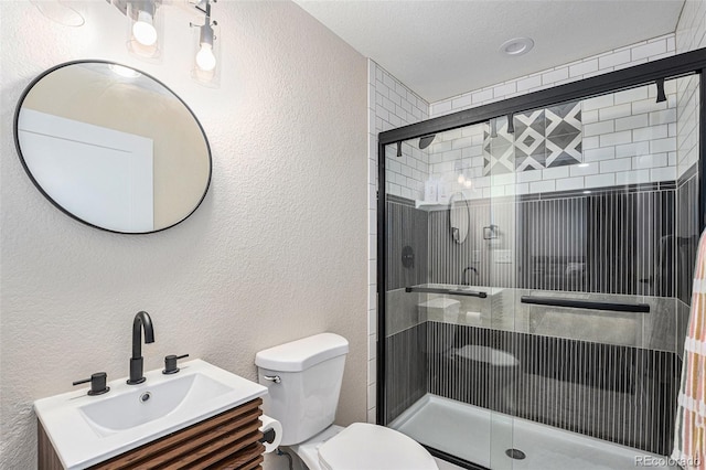 1473 Castle Creek Cir, Castle Rock, CO 80104 - full bath with a textured wall, a stall shower, and vanity