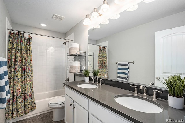 1473 Castle Creek Cir, Castle Rock, CO 80104 - full bathroom with double vanity, shower / bath combo, and wood finished floors