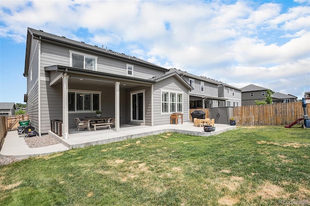 1473 Castle Creek Cir, Castle Rock, CO 80104 - rear view of property with a patio area and a fenced backyard