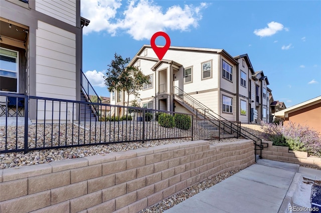 4569 Copeland Loop Unit 203, Highlands Ranch, CO 80126 - exterior space with stairway and a residential view