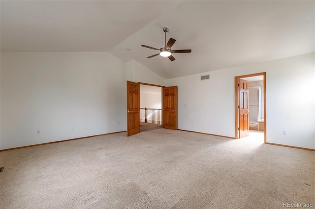 5571 S Sicily St, Aurora, CO 80015 - unfurnished bedroom featuring light carpet, ensuite bathroom, a ceiling fan, and high vaulted ceiling