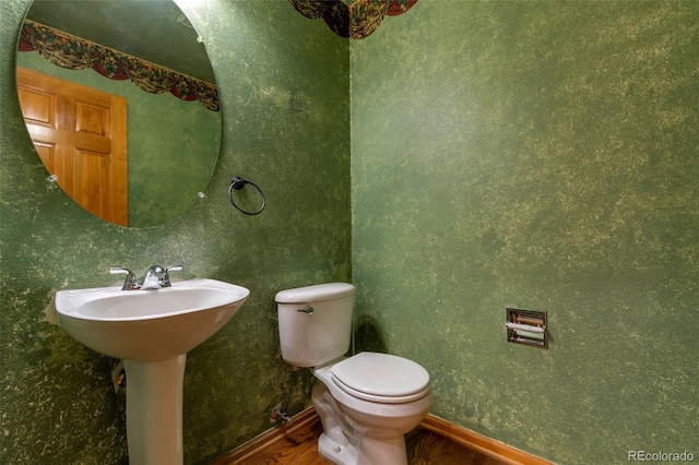 5571 S Sicily St, Aurora, CO 80015 - bathroom featuring toilet and wood finished floors