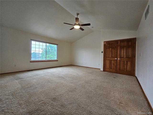 5571 S Sicily St, Aurora, CO 80015 - unfurnished bedroom featuring vaulted ceiling, carpet flooring, and ceiling fan