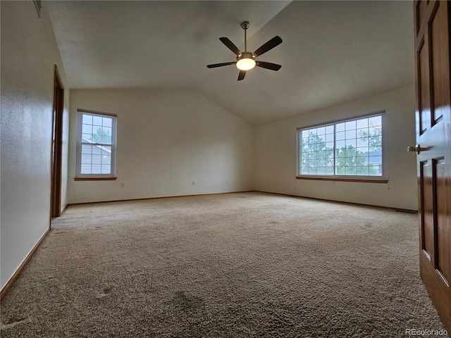5571 S Sicily St, Aurora, CO 80015 - unfurnished living room featuring carpet flooring, vaulted ceiling, and ceiling fan