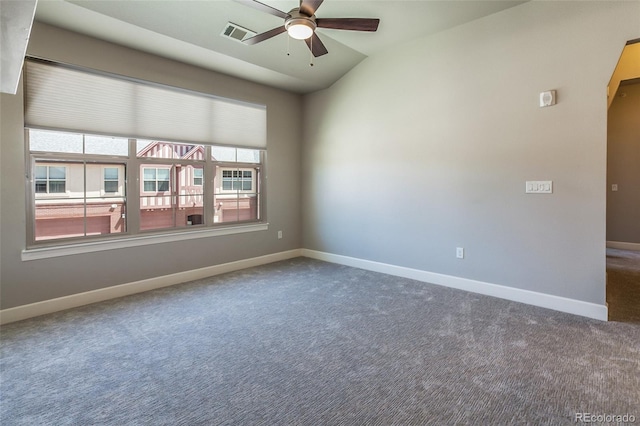 carpeted spare room with ceiling fan and lofted ceiling